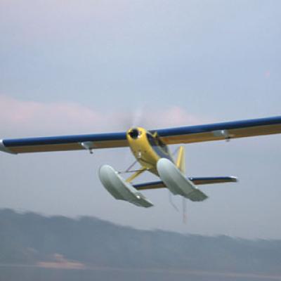 a large air plane flying in the sky