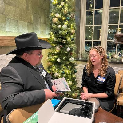 two educators conversing