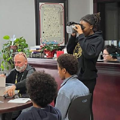 a group of people sitting at a table