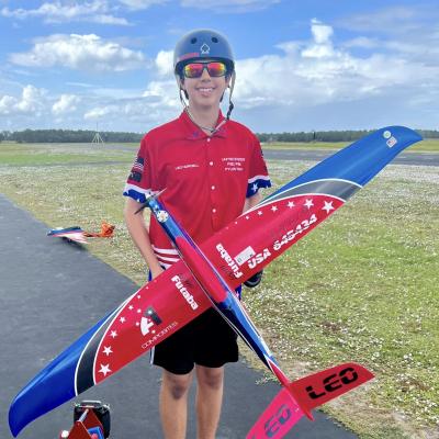 Leo Nordell with model aircraft posing for the camera