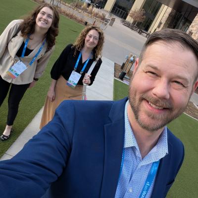 Three AMA Education Team staff smile for a picture at the WAI Conference.