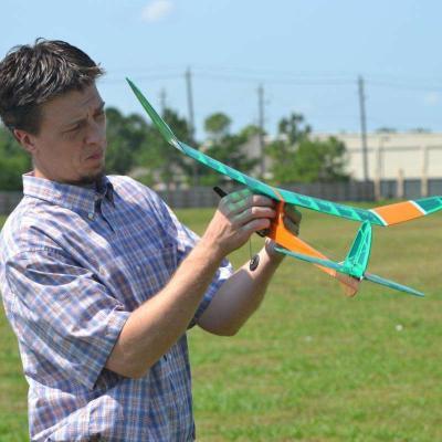 Man checking a model plane
