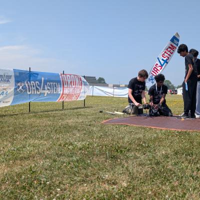UAS4STEM Team working on their drone at AirVenture Oshkosh