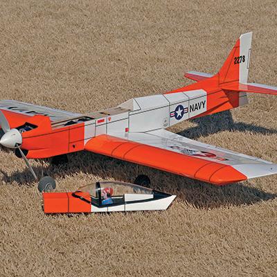 toy,orange,small,kite,sitting,machine,grass,little,child,man,playing,boy,young,plane,open,airplane,flying,holding,laying,table,remote,colorful,woman,riding,air,train