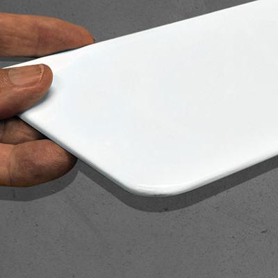 a hand holding a box