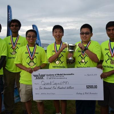 a group of people posing for the camera