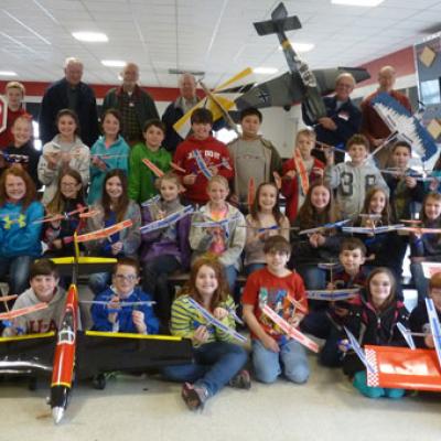 TMS fifth grade gifted students, teachers Susan Mitchell, Rita Sparks, and Nicole Naro, and ARCA members Jim Pappas, Jim Reining, Jonny Williams, Danny McDevitt, Red Robinson, Leslie Harrison and Larry Graves at TMS after students made their model airplanes. (Contributed) 