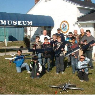 a group of people standing in front of a building