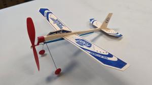 a close up of a balsa glider