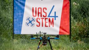 a drone in front of a UAS4STEM sign