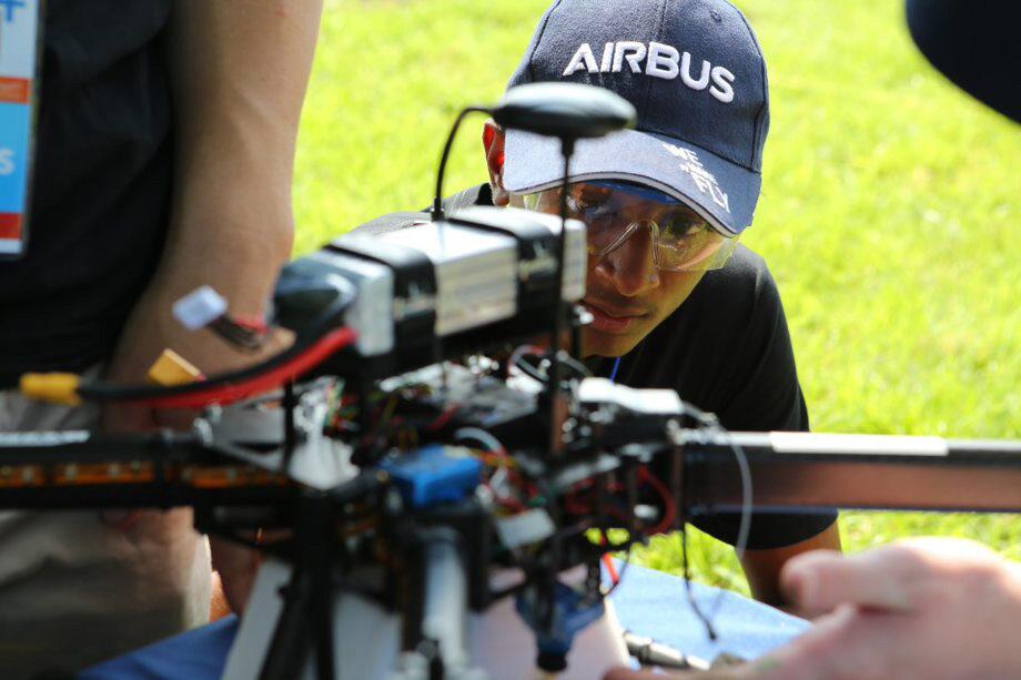 person,outdoor,grass,man,boy,holding,young,baseball,child,little,wearing,small,front,sitting,bat,standing,table,player,uniform,food,woman,playing,people,game,phone,plate,pizza,ball,riding