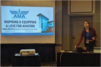 Gwen Mathis presents educational resources to an audience of educators at the February HASTI conference. 