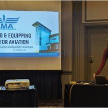 Gwen Mathis presents educational resources to an audience of educators at the February HASTI conference. 