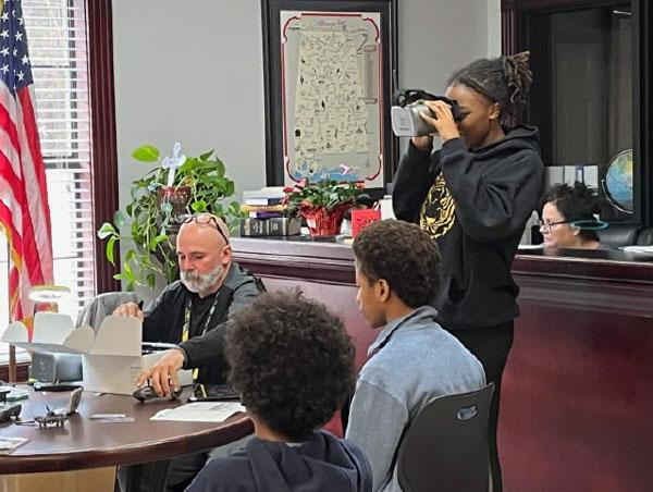 a group of people sitting at a table
