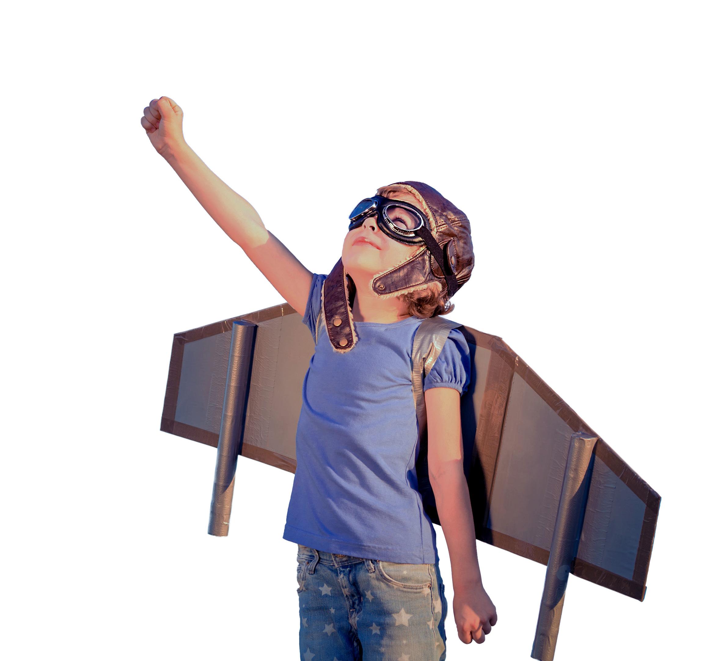 A child wearing cardboard wings and posing. 
